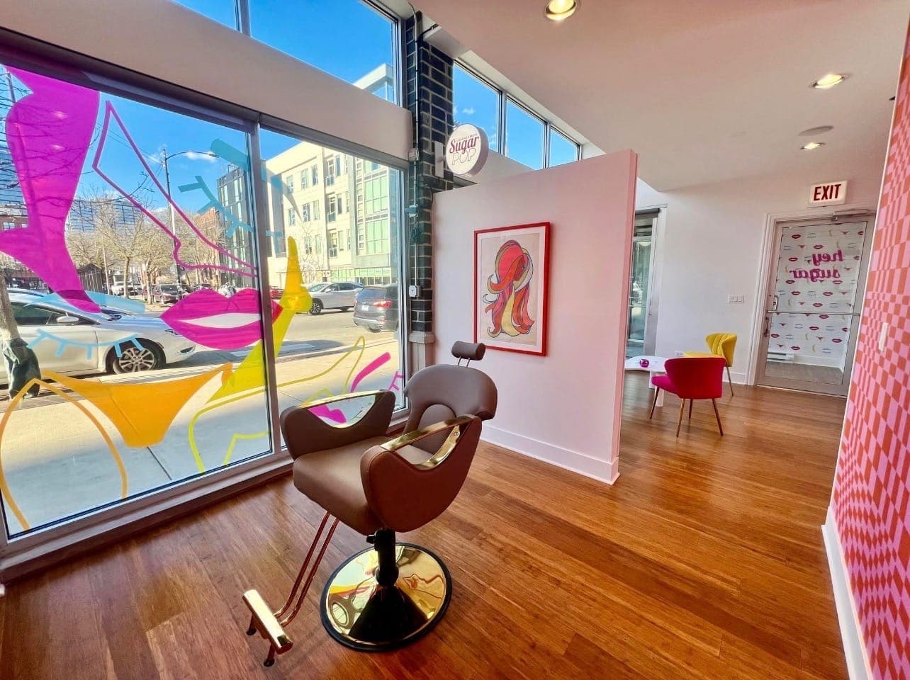 A styling chair by the front window of Sugar Pop Salon in Chicago's West Loop